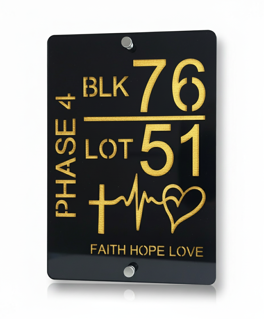 Black Sign with Gold Engraving